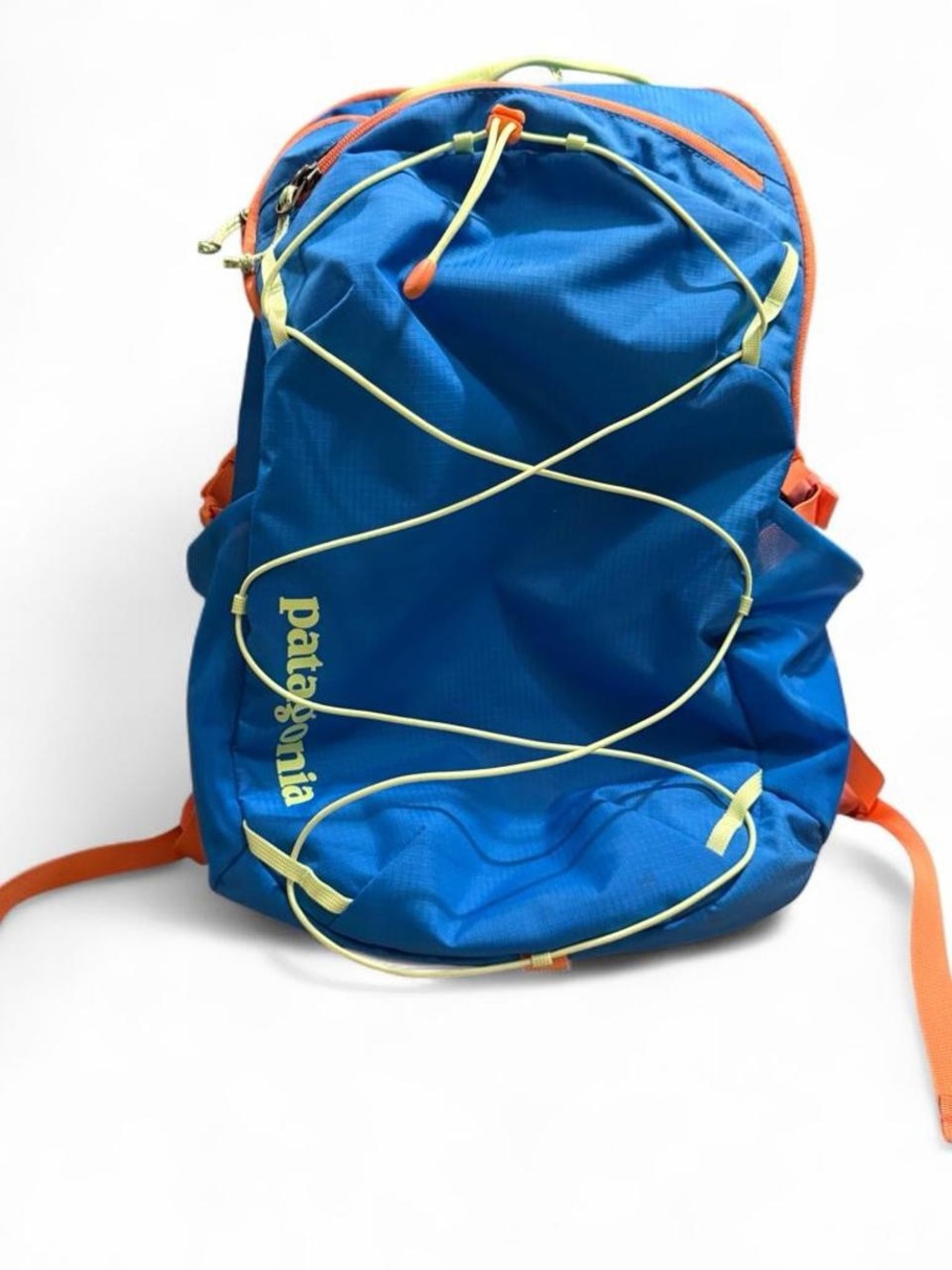 Patagonia blue backpack with neon yellow cord and orange trim